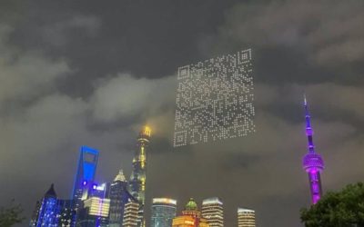 Drones hovered over Shanghai’s futuristic backdrop and a QR code became visible